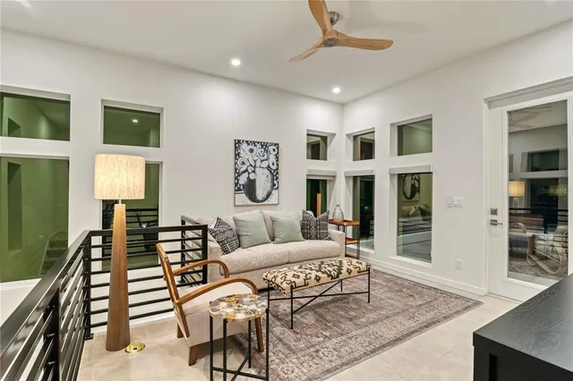 a view of swimming pool with outdoor seating