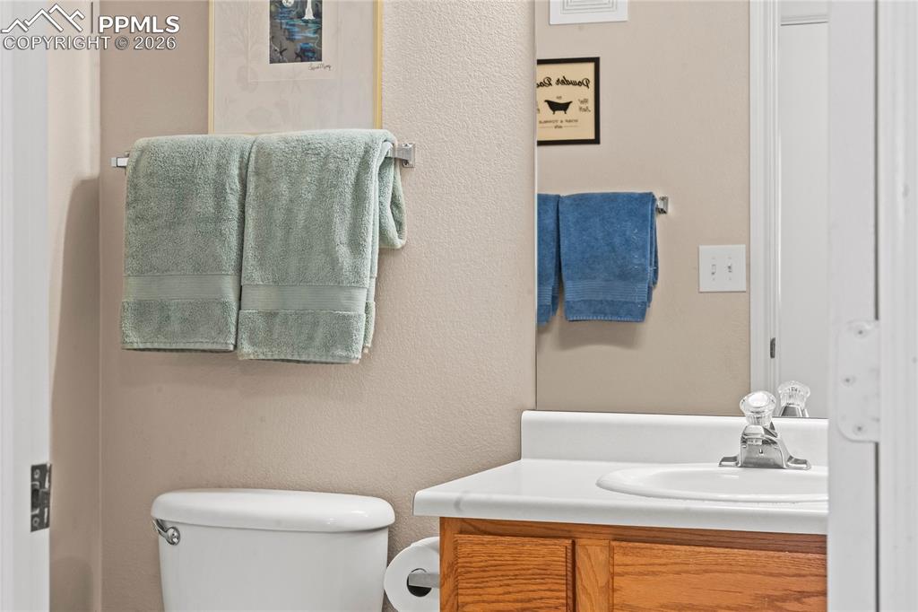3976 Riviera Grove, Unit 203 Colorado Springs, CO 80922 - Photo 25 of 45 a bathroom with a sink and a toilet