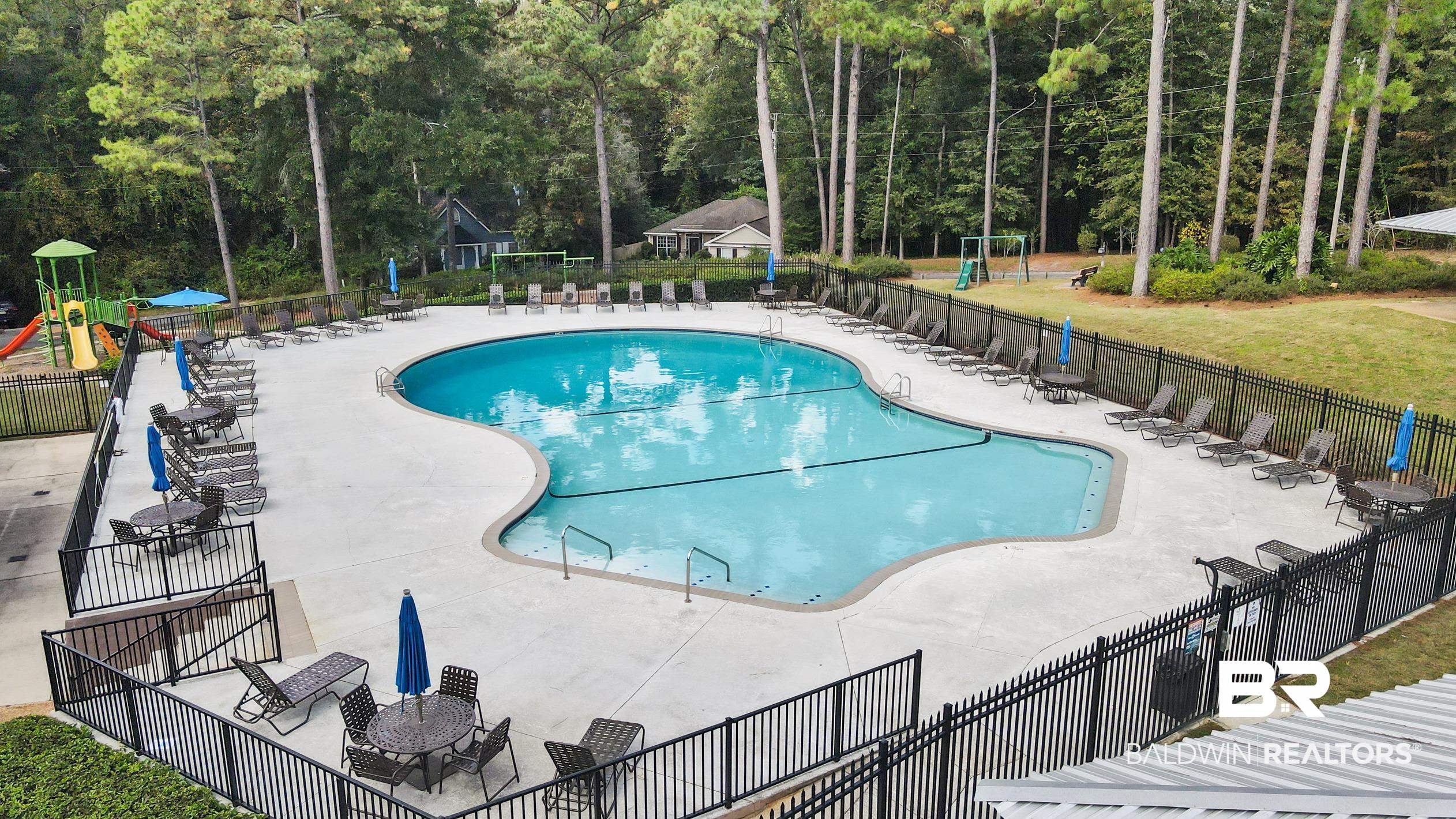 511 Ridgewood Drive Daphne, AL 36526 - Photo 54 of 59 View of pool with a playground and a patio area