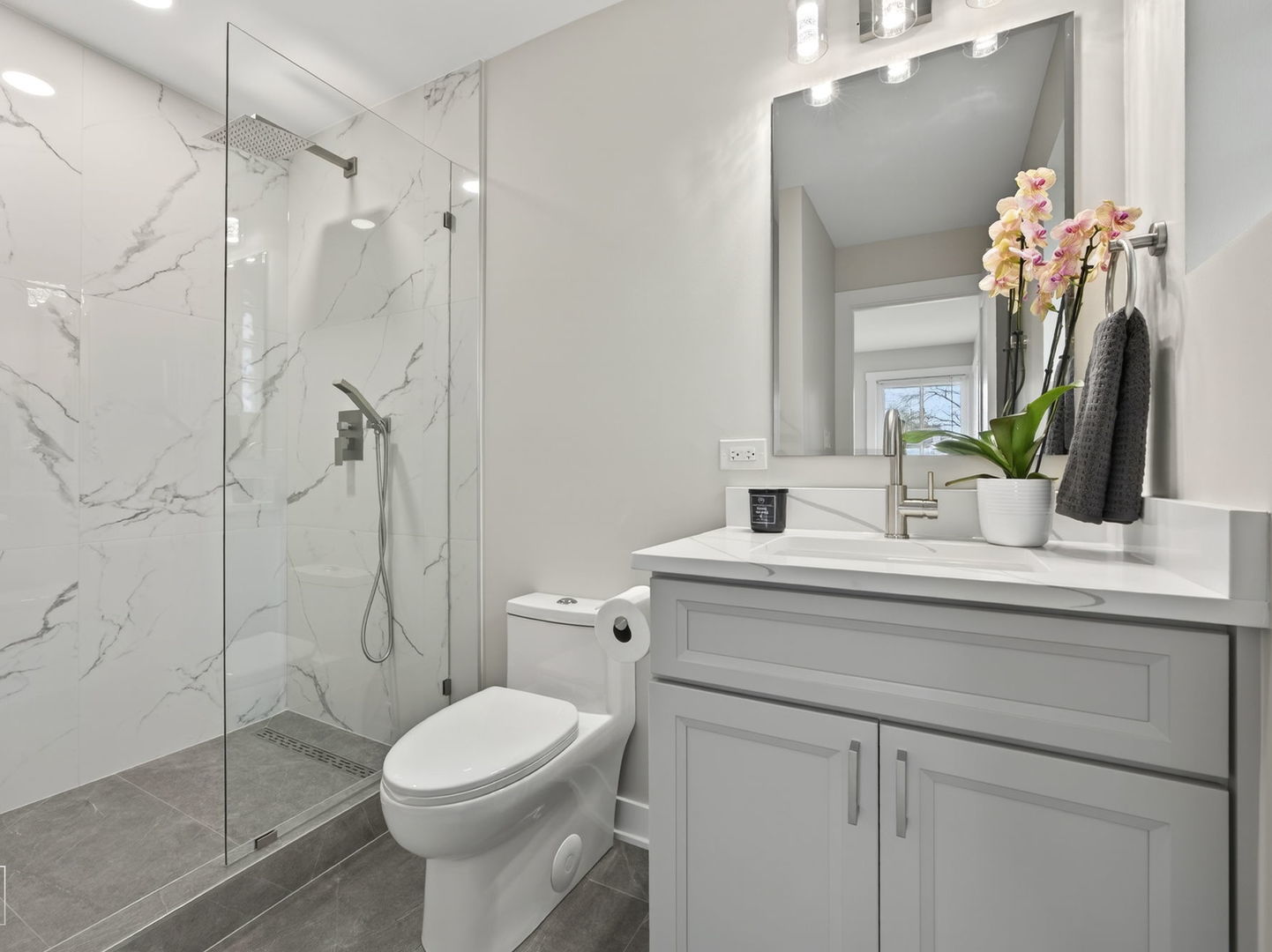 1011 Maitland Drive Lockport, IL 60441 - Photo 10 of 23 a bathroom with a sink toilet and shower