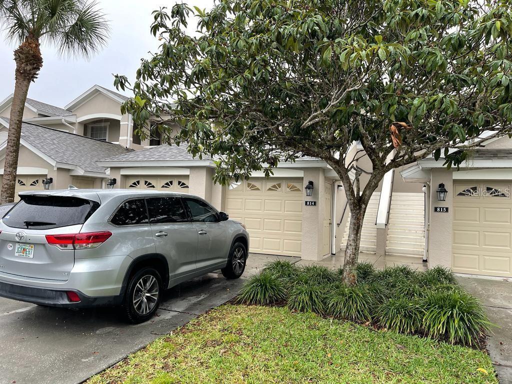 9422 Myrtle Creek Lane, Unit 814 Orlando, FL 32832 - Photo 1 of 1 a view of a car in front of a house