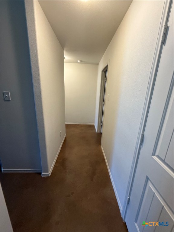4405 Texas Rangers Drive Killeen, TX 76549 - Photo 13 of 22 a view of a hallway with wooden floor