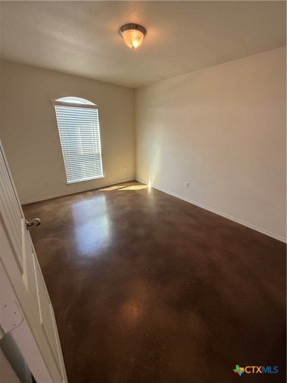 4405 Texas Rangers Drive Killeen, TX 76549 - Photo 3 of 22 an empty room with wooden floor and windows