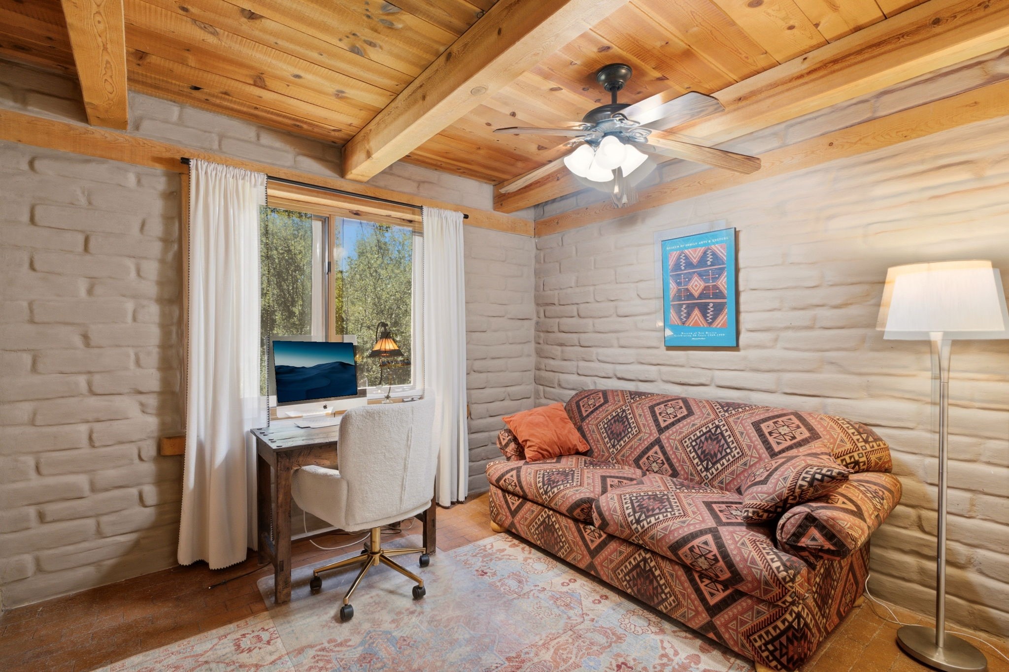 22 Mimosa Road Santa Fe, NM 87508 - Photo 21 of 51 Guest room 2 - exposed adobe walls, brick floors and beamed ceilings
