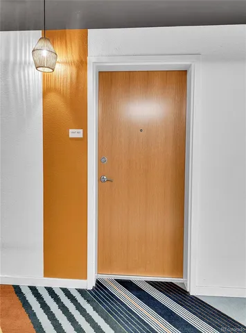 a view of room with wooden floor