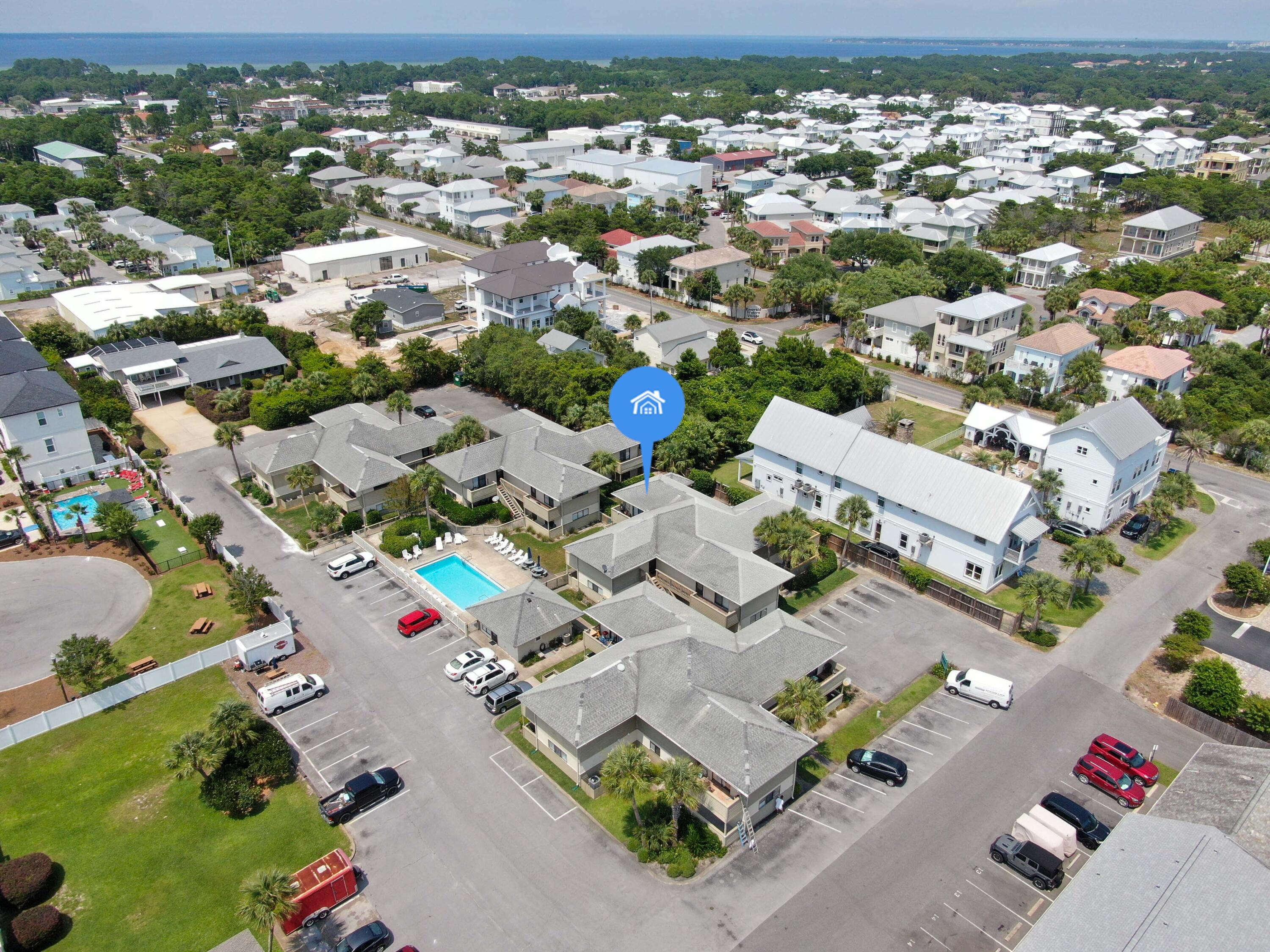 64 Cross Creek Road, Unit 11 Miramar Beach, FL 32550 - Photo 19 of 20 an aerial view of residential houses with outdoor space
