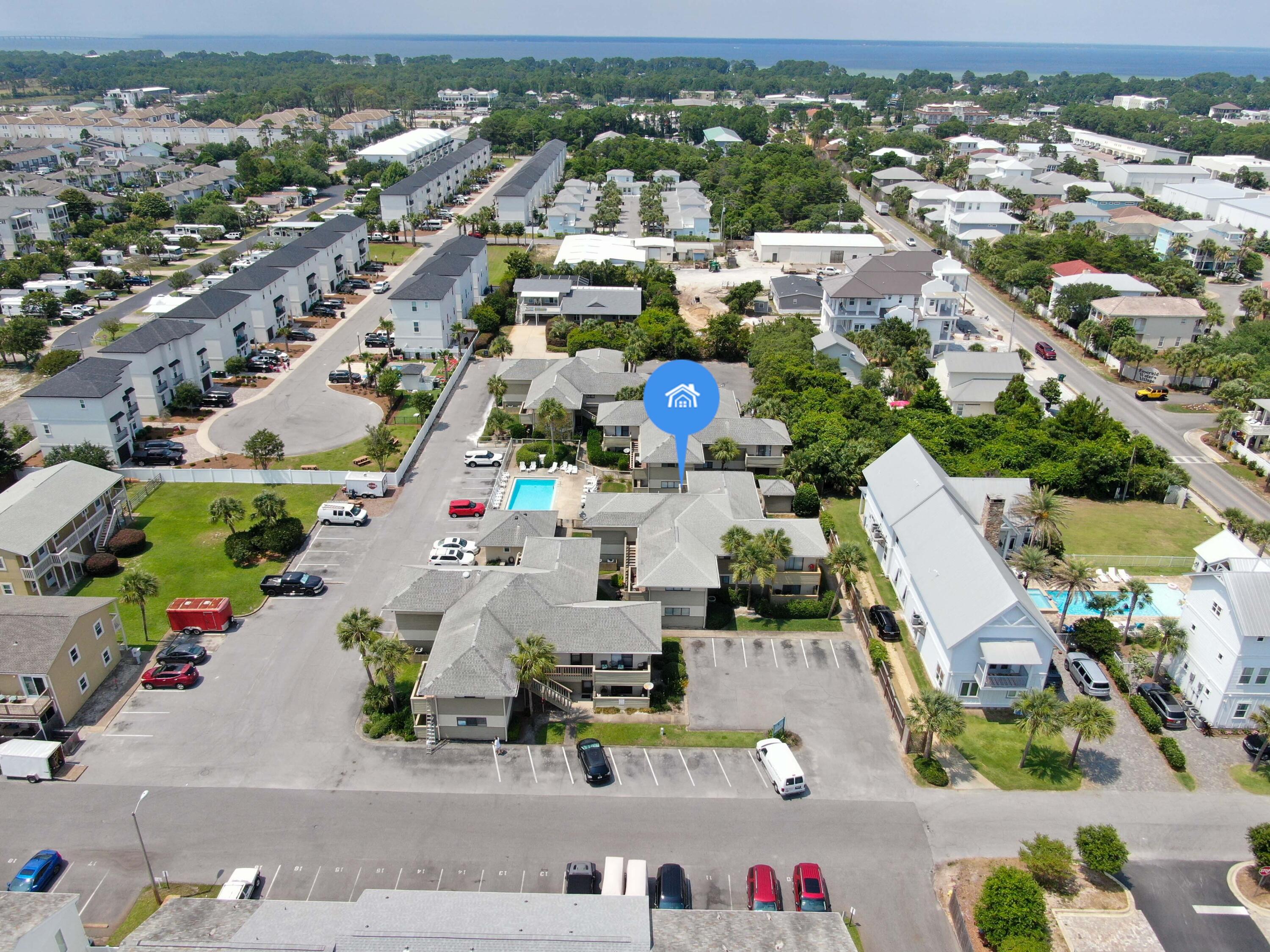 64 Cross Creek Road, Unit 11 Miramar Beach, FL 32550 - Photo 20 of 20 an aerial view of a city with lots of residential buildings