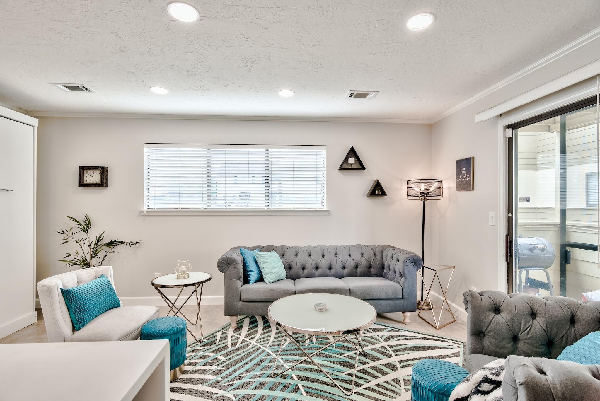 64 Cross Creek Road, Unit 11 Miramar Beach, FL 32550 - Photo 3 of 20 a living room with furniture and a large window