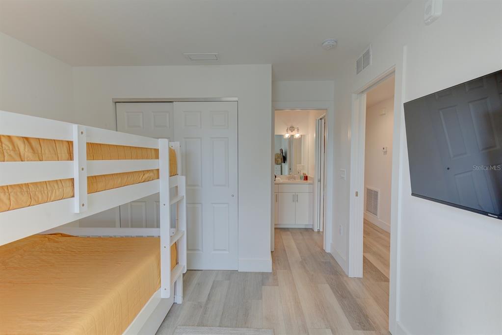 15305 1st Street East, Unit 202 Madeira Beach, FL 33708 - Photo 27 of 40 a view of wooden floor