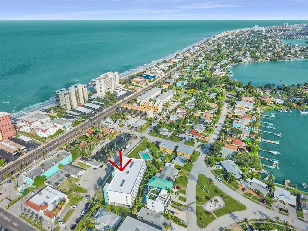 15305 1st Street East, Unit 202 Madeira Beach, FL 33708 - Photo 40 of 40 a picture of city view with lake view and mountain view