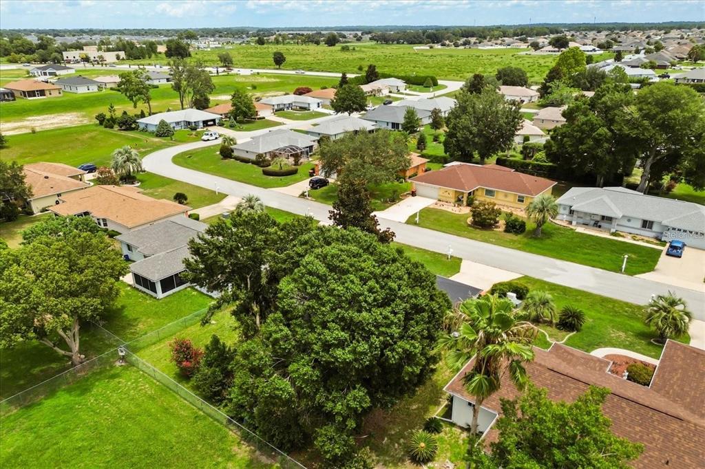 6027 Southwest 98th Street Road Ocala, FL 34476 - Photo 35 of 44 an aerial view of residential houses with outdoor space and swimming pool