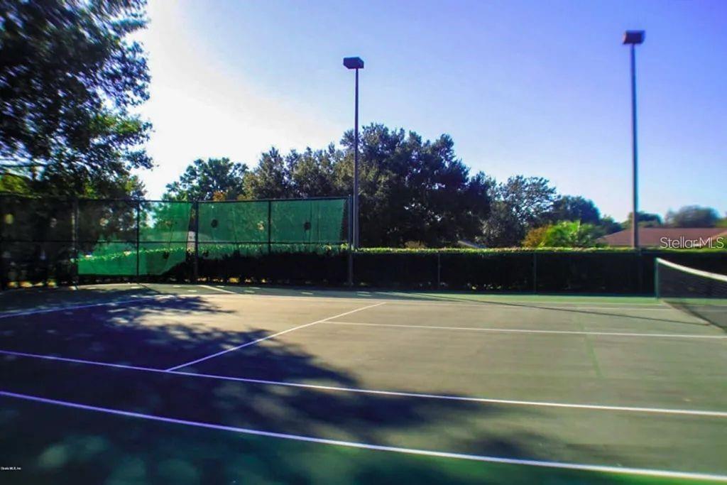 6027 Southwest 98th Street Road Ocala, FL 34476 - Photo 43 of 44 a view of a tennis court