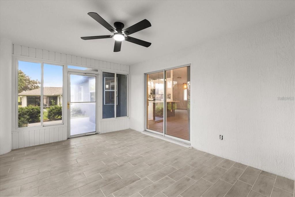 6027 Southwest 98th Street Road Ocala, FL 34476 - Photo 8 of 44 a view of an empty room with a window