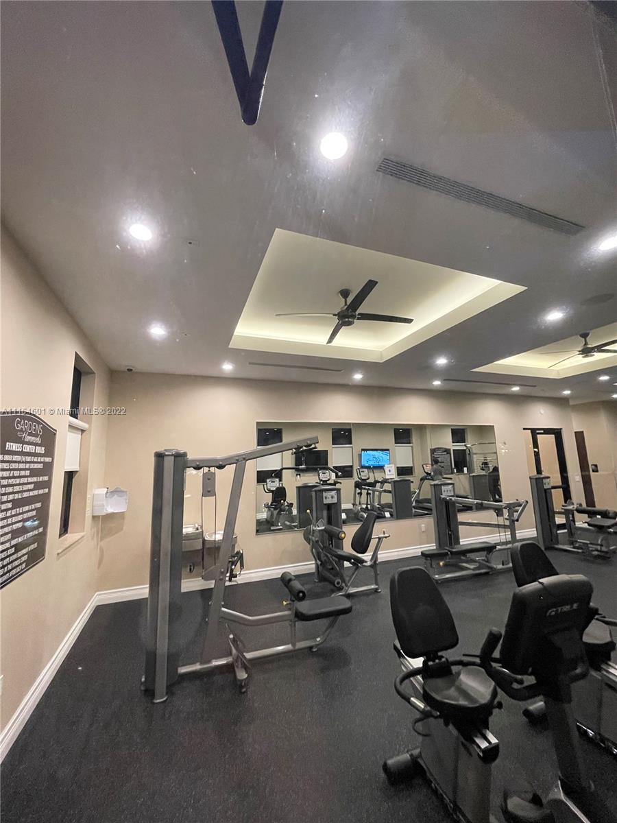 15086 Southwest 116th Street Miami, FL 33196 - Photo 17 of 19 a view of a room with gym equipment