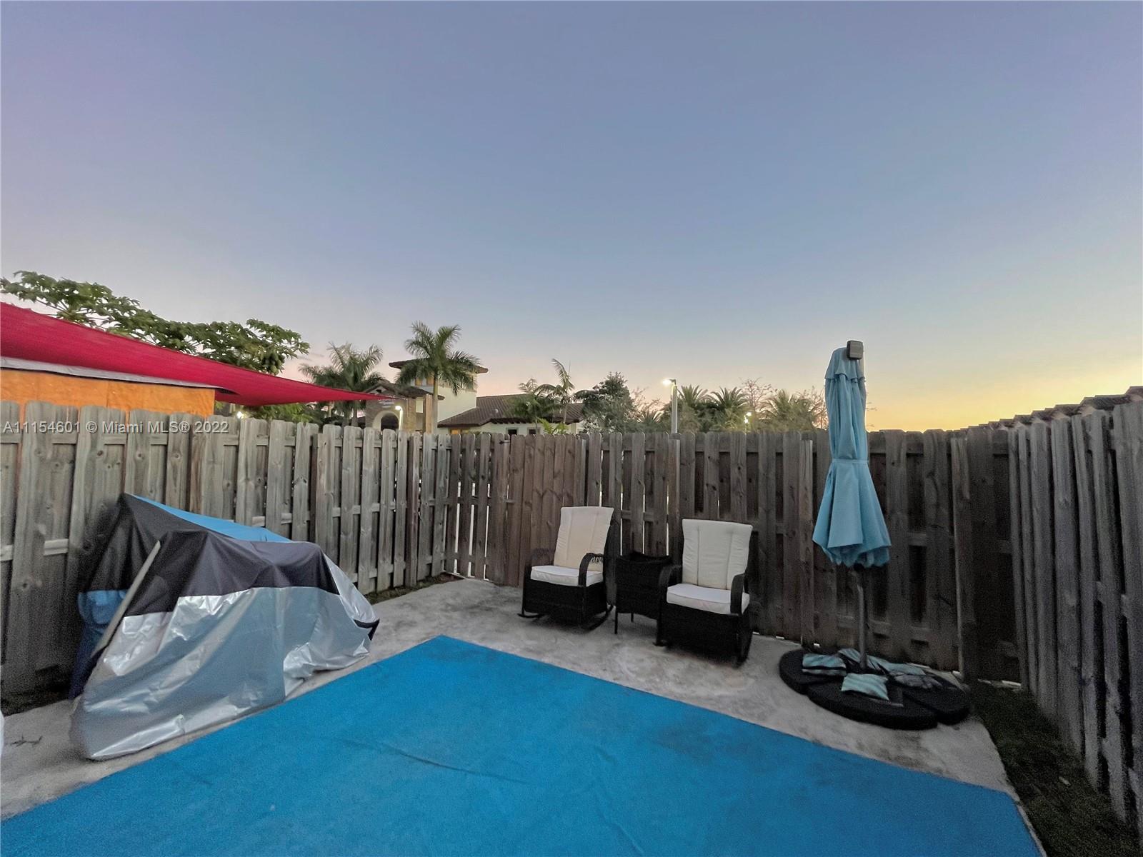 15086 Southwest 116th Street Miami, FL 33196 - Photo 4 of 19 a view of sitting area with furniture