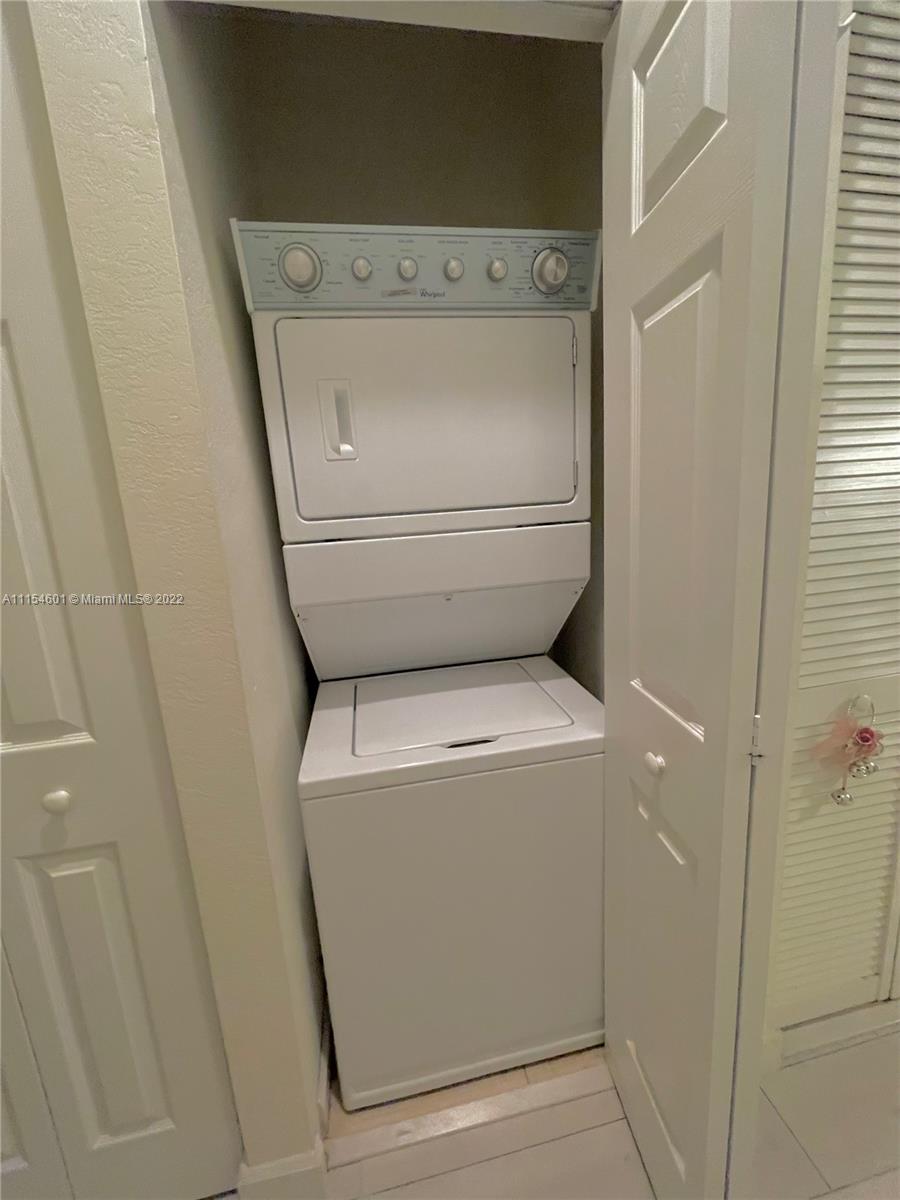 15086 Southwest 116th Street Miami, FL 33196 - Photo 10 of 19 a utility room with dryer and washer