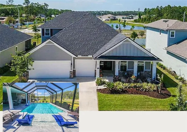 an aerial view of a house with garden space and sitting area