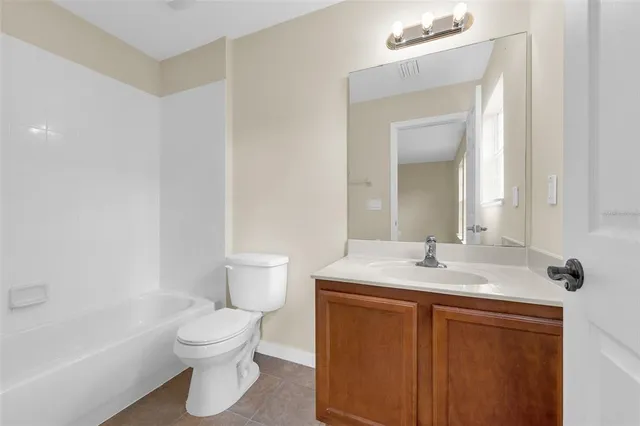 a view of a garden with a pathway