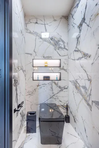 a view of a house with swimming pool and sitting area