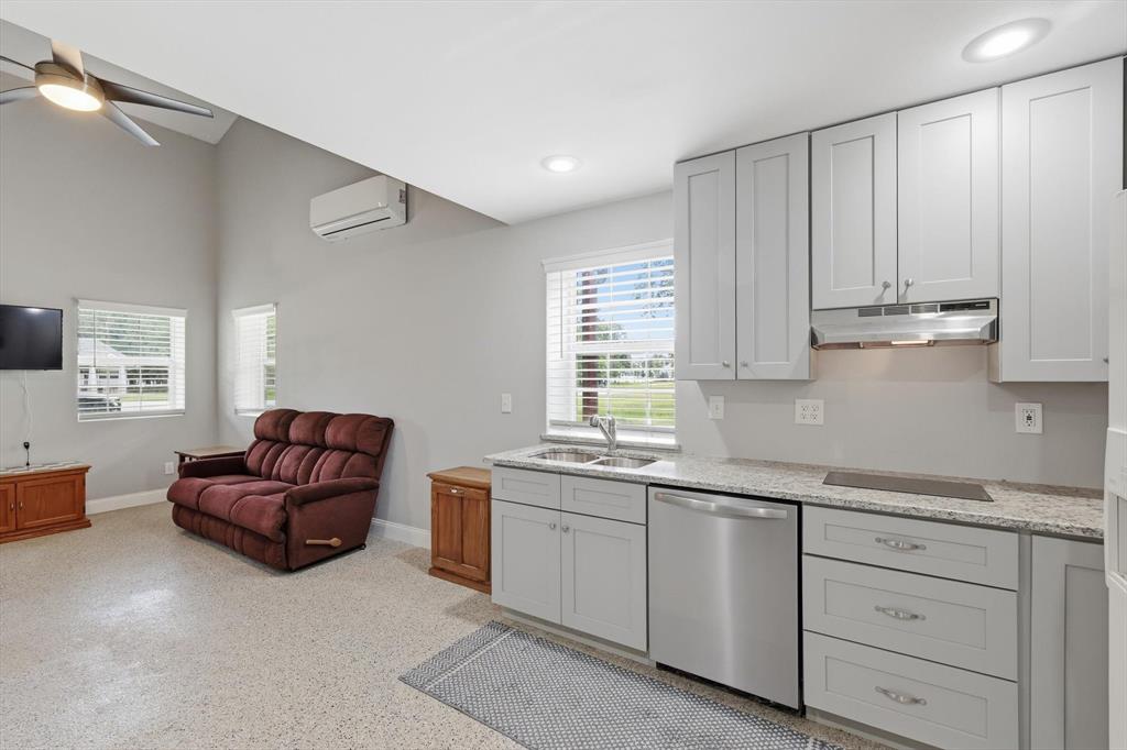 7366 Point Aquarius Quinlan, TX 75474 - Photo 11 of 30 a living room with furniture and a window