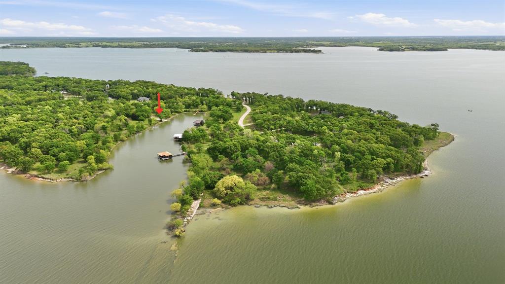 7366 Point Aquarius Quinlan, TX 75474 - Photo 20 of 30 a view of a lake from a yard