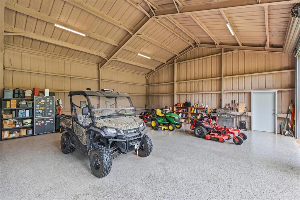 7366 Point Aquarius Quinlan, TX 75474 - Photo 23 of 30 a view of a storage room with a table