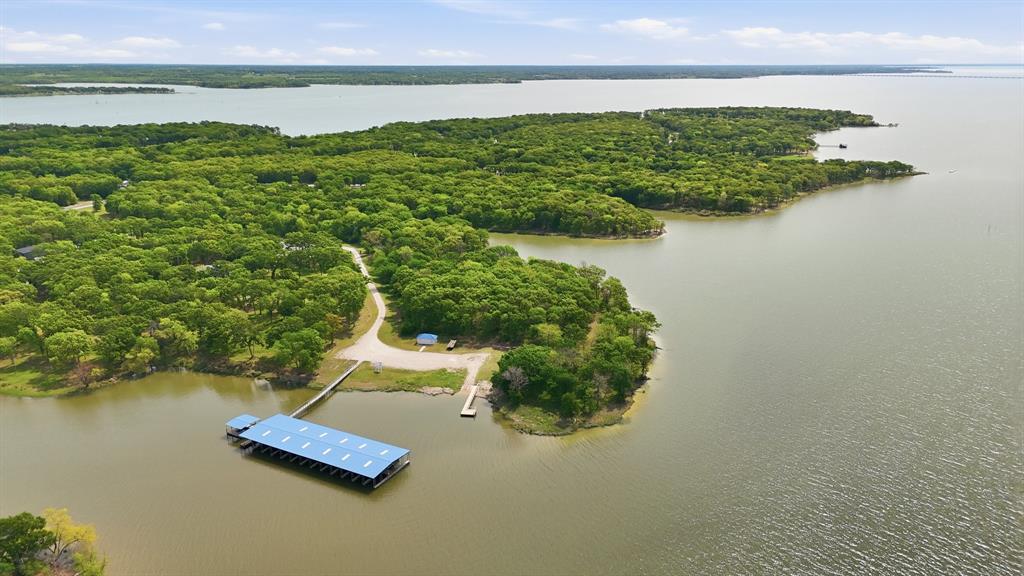 7366 Point Aquarius Quinlan, TX 75474 - Photo 28 of 30 a view of a lake with a mountain