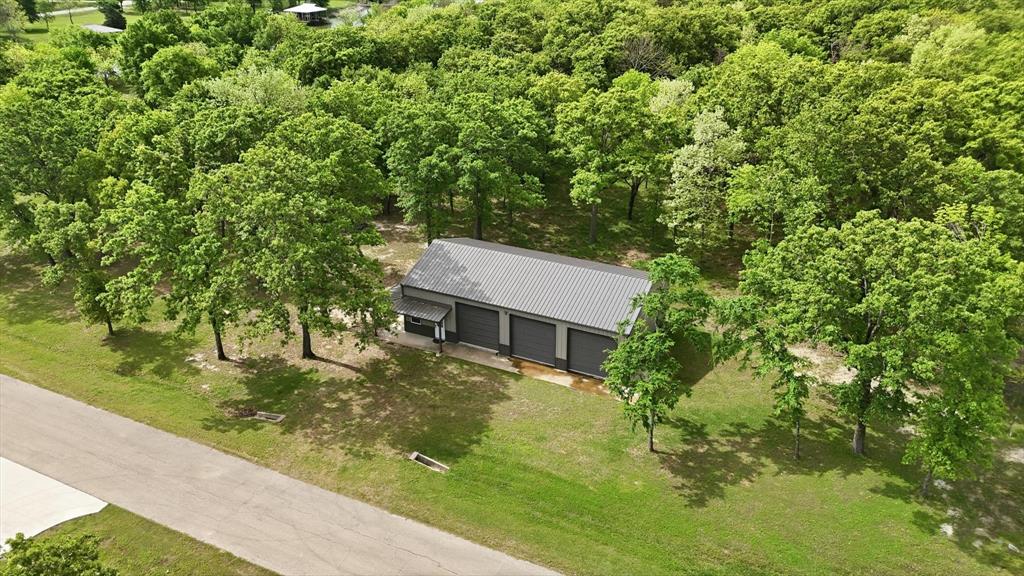 7366 Point Aquarius Quinlan, TX 75474 - Photo 29 of 30 a house view with a garden space