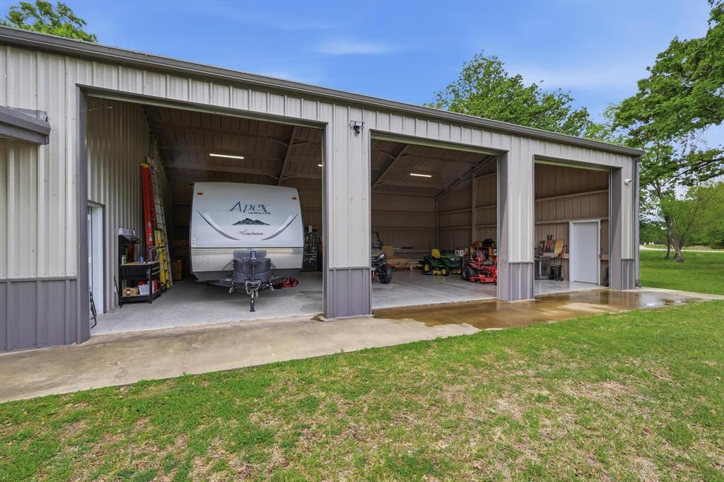 7366 Point Aquarius Quinlan, TX 75474 - Photo 6 of 30 a view of a house with backyard and porch