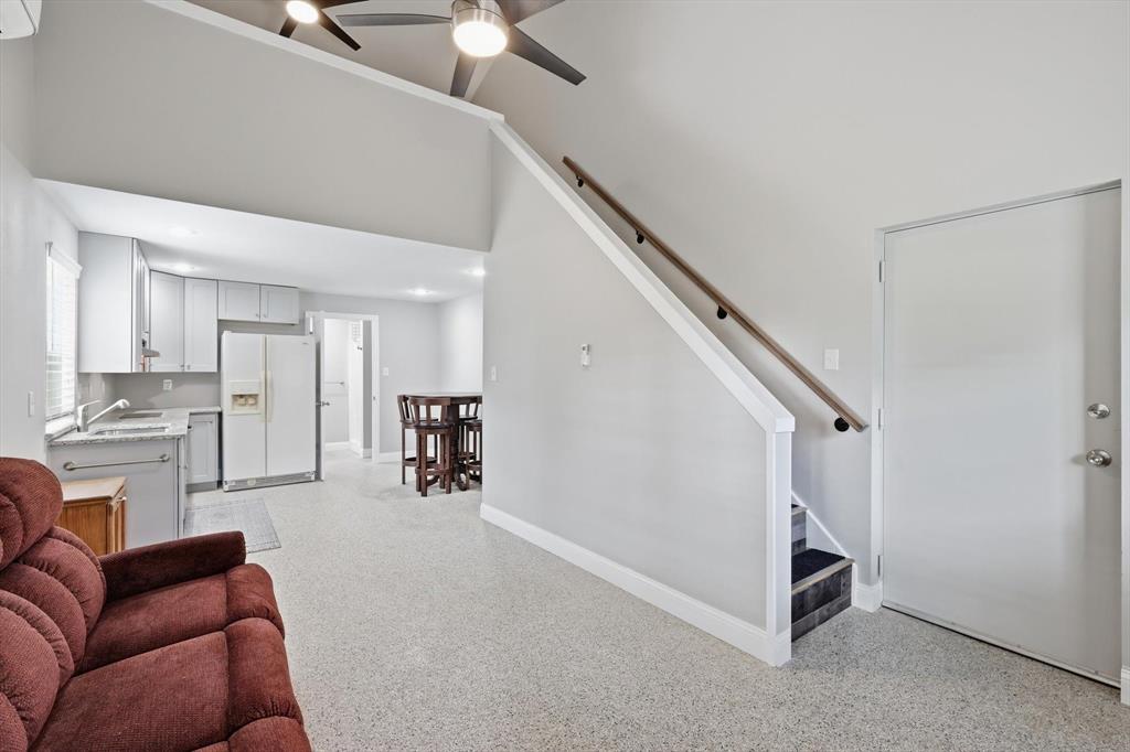 7366 Point Aquarius Quinlan, TX 75474 - Photo 10 of 30 a living room with furniture and a view of kitchen