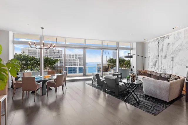 a view of a chairs and table in a room