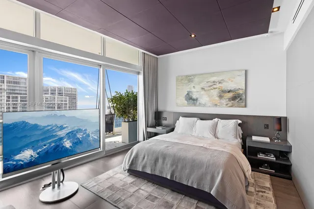 a balcony with view of outdoor space