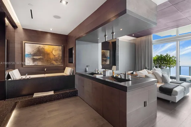 a room with furniture and a large window