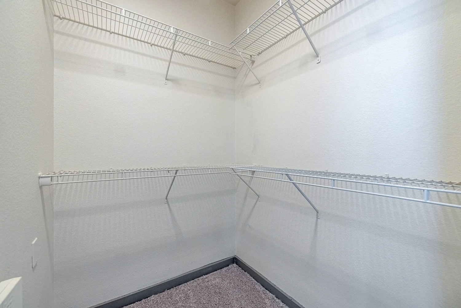 8515 Interstate 35, Unit 16218 Austin, TX 78744 - Photo 15 of 19 a view of a room with racks on the wall