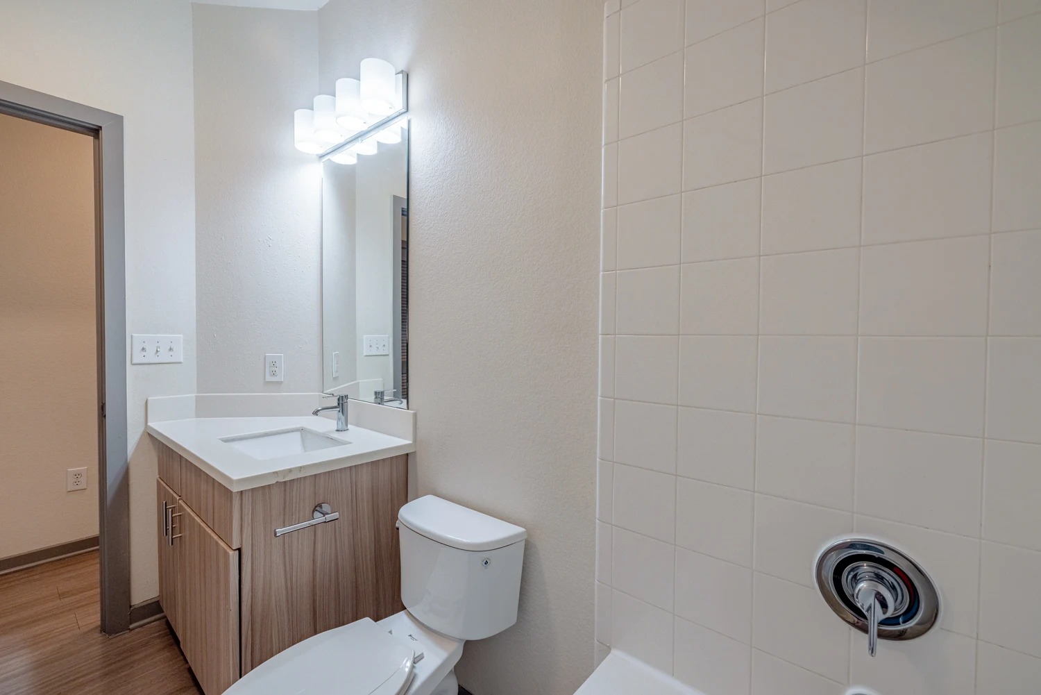 8515 Interstate 35, Unit 16218 Austin, TX 78744 - Photo 7 of 19 a bathroom with a toilet a sink and mirror