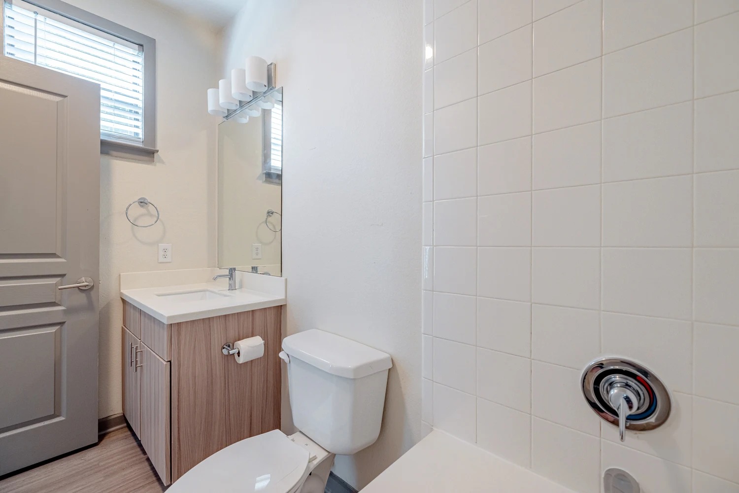 8515 Interstate 35, Unit 16218 Austin, TX 78744 - Photo 8 of 19 a bathroom with a sink a toilet and mirror