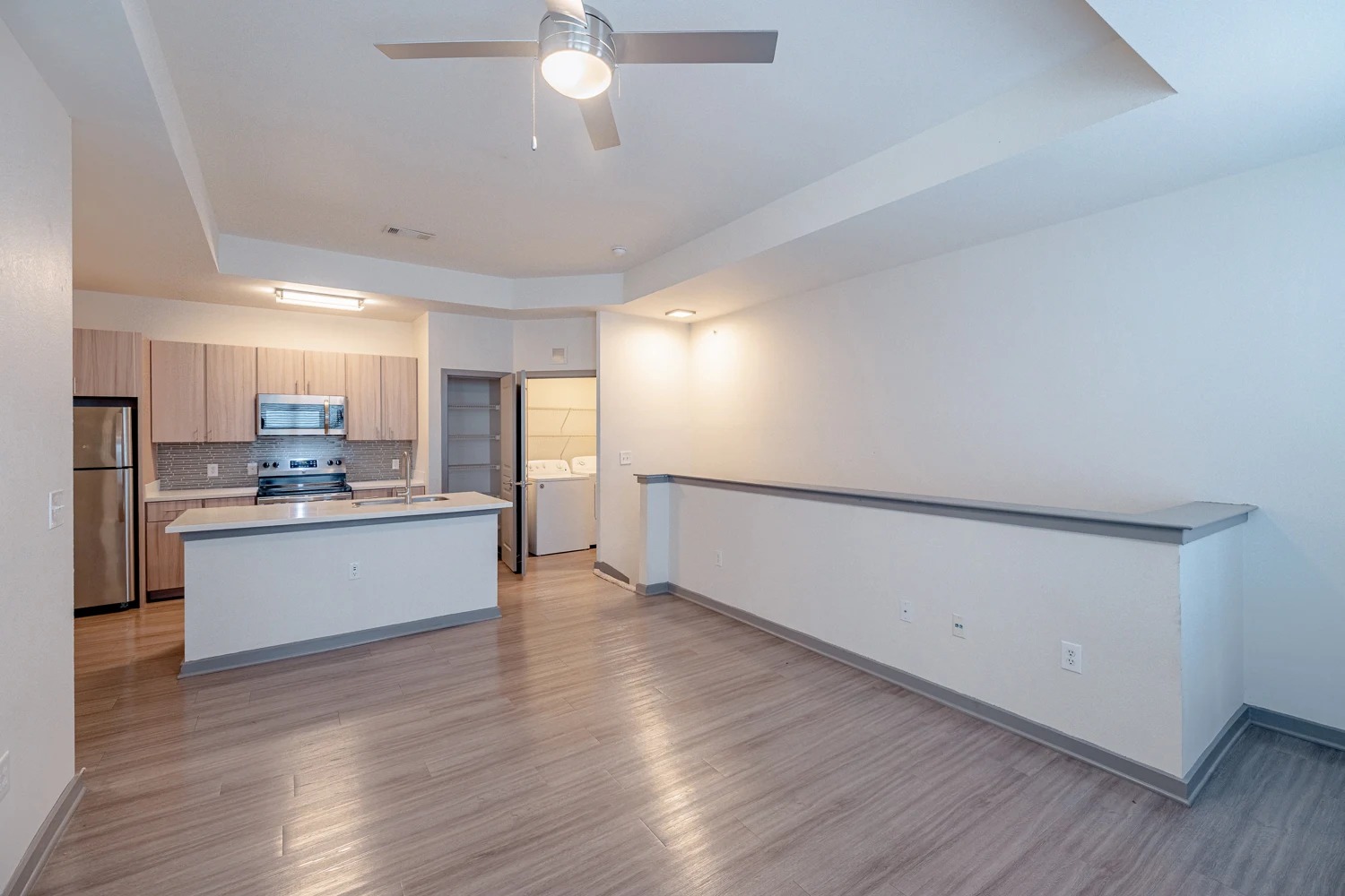 8515 Interstate 35, Unit 16218 Austin, TX 78744 - Photo 10 of 19 a view of kitchen with wooden floor