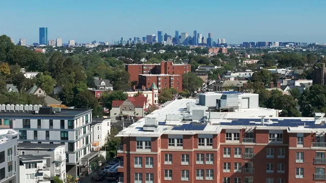 a view of city with tall buildings