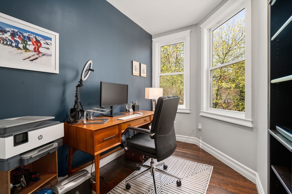 91 Glen Road, Unit 2 Boston, MA 02130 - Photo 14 of 31 a view of a workspace with furniture and a window
