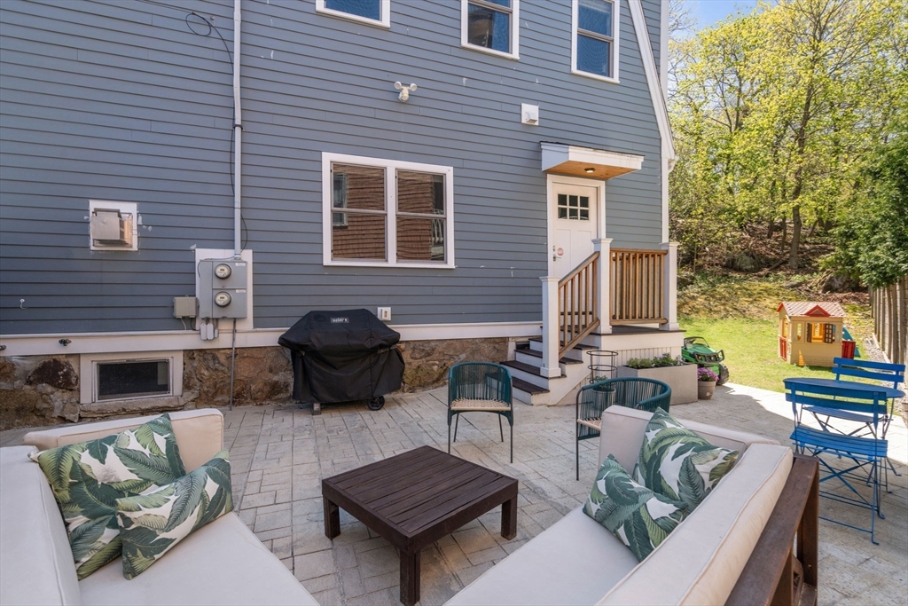 91 Glen Road, Unit 2 Boston, MA 02130 - Photo 18 of 31 a backyard of a house with seating space