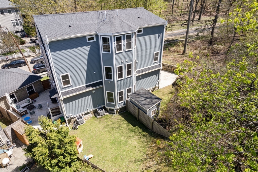 91 Glen Road, Unit 2 Boston, MA 02130 - Photo 30 of 31 front view of a house with a yard