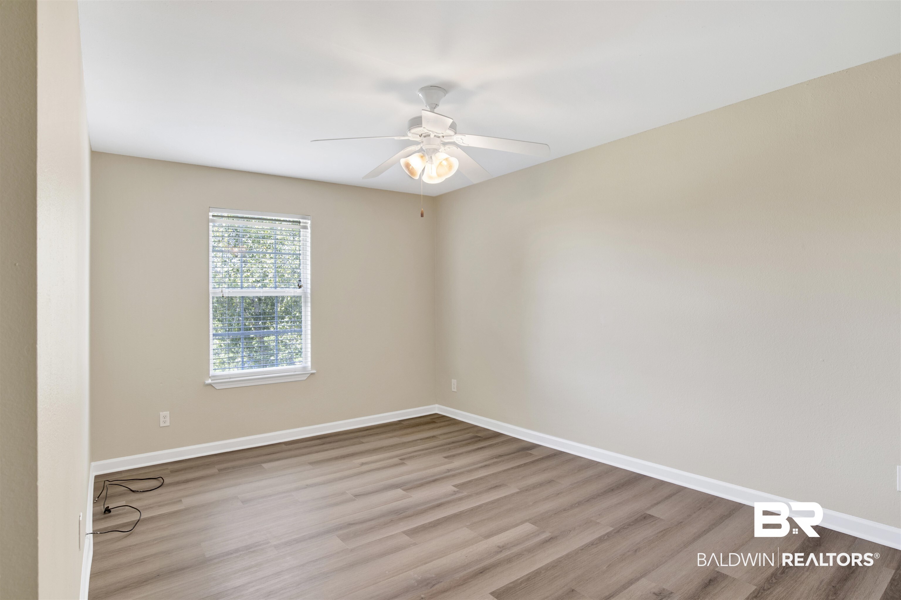 2002 Shelene Way Foley, AL 36535 - Photo 20 of 23 Empty room with light wood-style flooring and ceiling fan