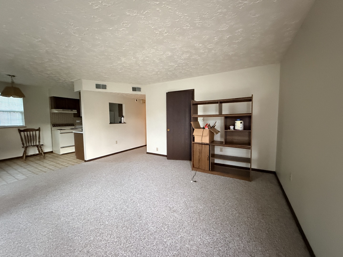 916 South 10th Street Herrin, IL 62948 - Photo 6 of 29 a view of empty room with furniture and cabinet