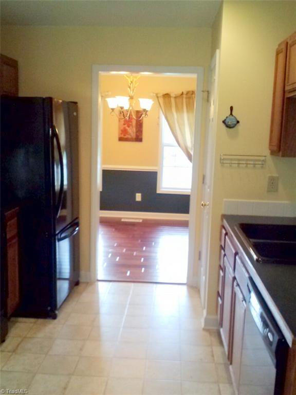 153 Winchester Road Advance, NC 27006 - Photo 12 of 20 Kitchen leading to formal dining room