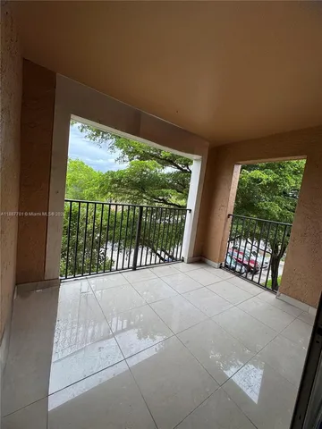 a view of a room with windows