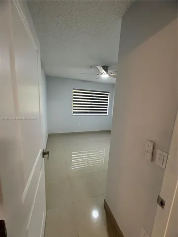 a view of kitchen and a window