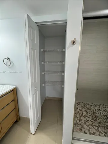 a view of storage and utility room