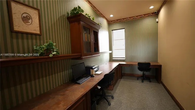 a room with gym equipment and a large window