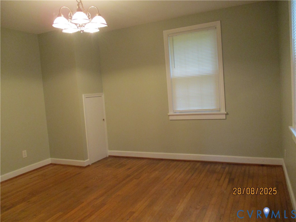 Undisclosed Address Hanover, VA 23069 - Photo 6 of 19 a view of a room with wooden floor and a window