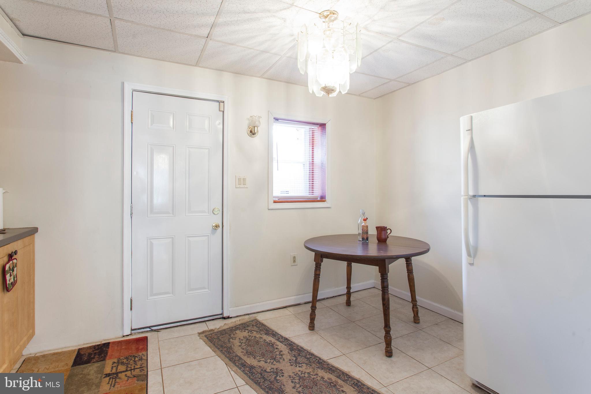 717 Tree Street Philadelphia, PA 19148 - Photo 14 of 27 Kitchen Dining Area & Exit to Patio